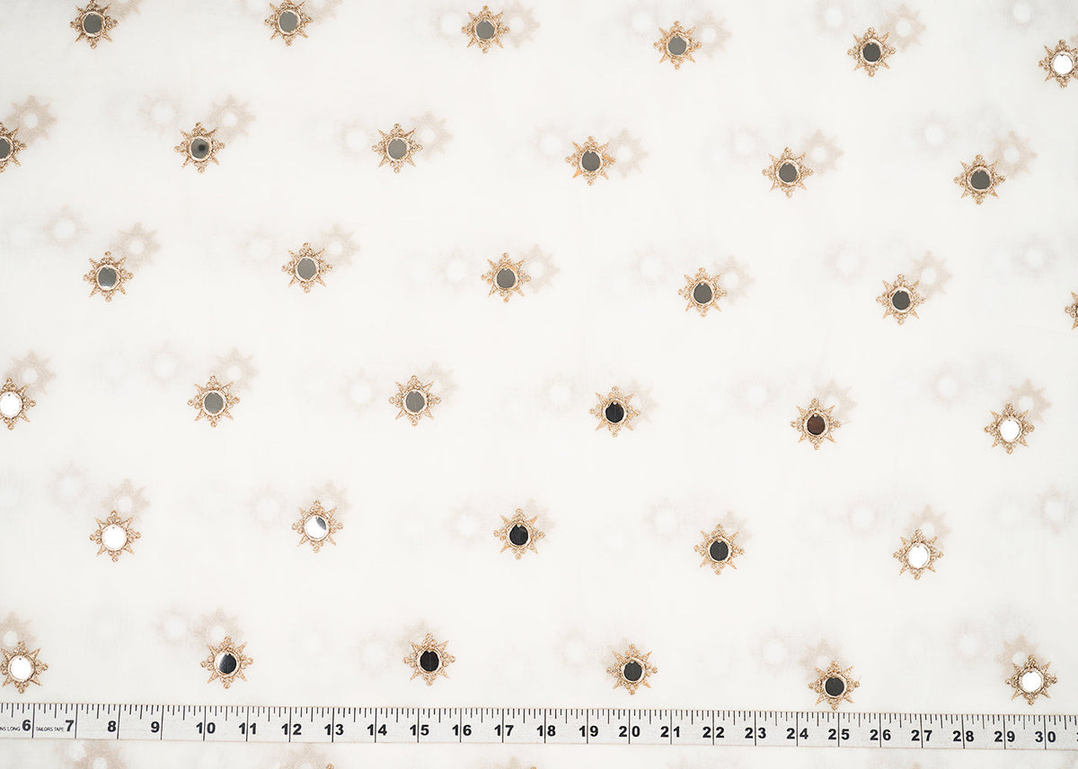 White Georgette Dyeable Fabric With All Over Buti Of Golden Zari And Faux Mirror Work PG 22409