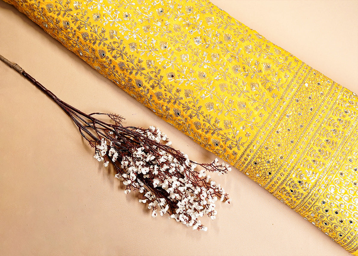 Yellow Silk Fabric with All Over Sequins and Mirror Work and One Side Heavy Border PG 16048