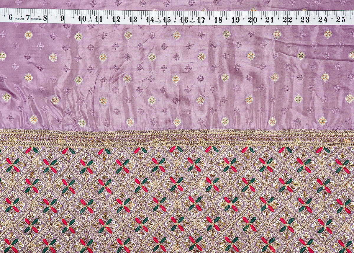 Lavender Silk Fabric With All Over Zari Buti With One Side Zari, Thread and Sequins Work Border PG 16001